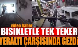 Isparta’da bisiklet sürücüsü yeraltı çarşısında tek teker gezdi