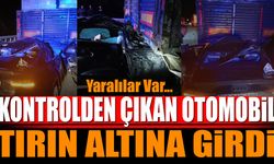 Kontrolden çıkan otomobil tırın altına girdi Yaralılar var