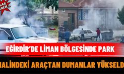 Eğirdir’de Liman Bölgesinde Park Halindeki Araçtan Dumanlar Yükseldi