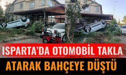 Isparta’da Otomobil Takla Atarak Bahçeye Düştü