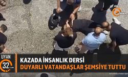 Isparta'da Trafik Kazası: Yaralı Sürücüye Şemsiye Desteği