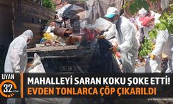 Mahalleyi saran koku şoke etti!Evden tonlarca çöp çıkarıldı