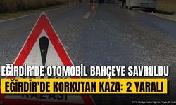Eğirdir'de kontrolden çıkan araç evin bahçesine savruldu