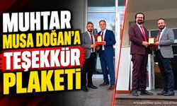 Isparta'da Muhtar Musa Doğan’a Teşekkür Plaketi