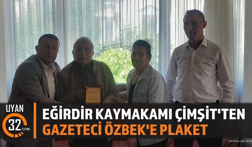 Gazeteci Hasan Özbek'e Anlamlı Plaket