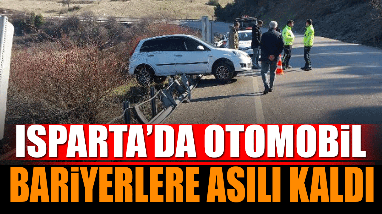 Isparta'da otomobil bariyerde asılı kaldı