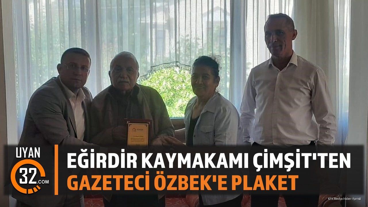 Gazeteci Hasan Özbek'e Anlamlı Plaket